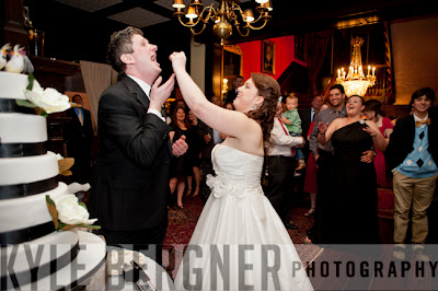 Bride and Groom eating cake at Mansion at the Valley Country Club