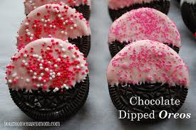 oreos they are my fav biscuit and my children's i love this pic !!! pink choc and sprinkles!!