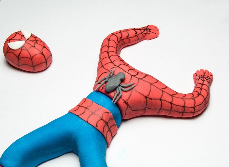 Spiderman fondant figurine topper spider on a back side 