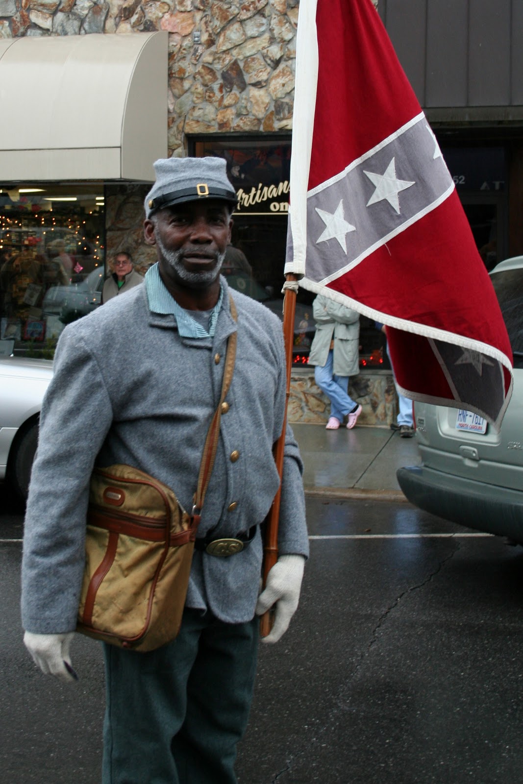 Image result for black man carrying confederate flag