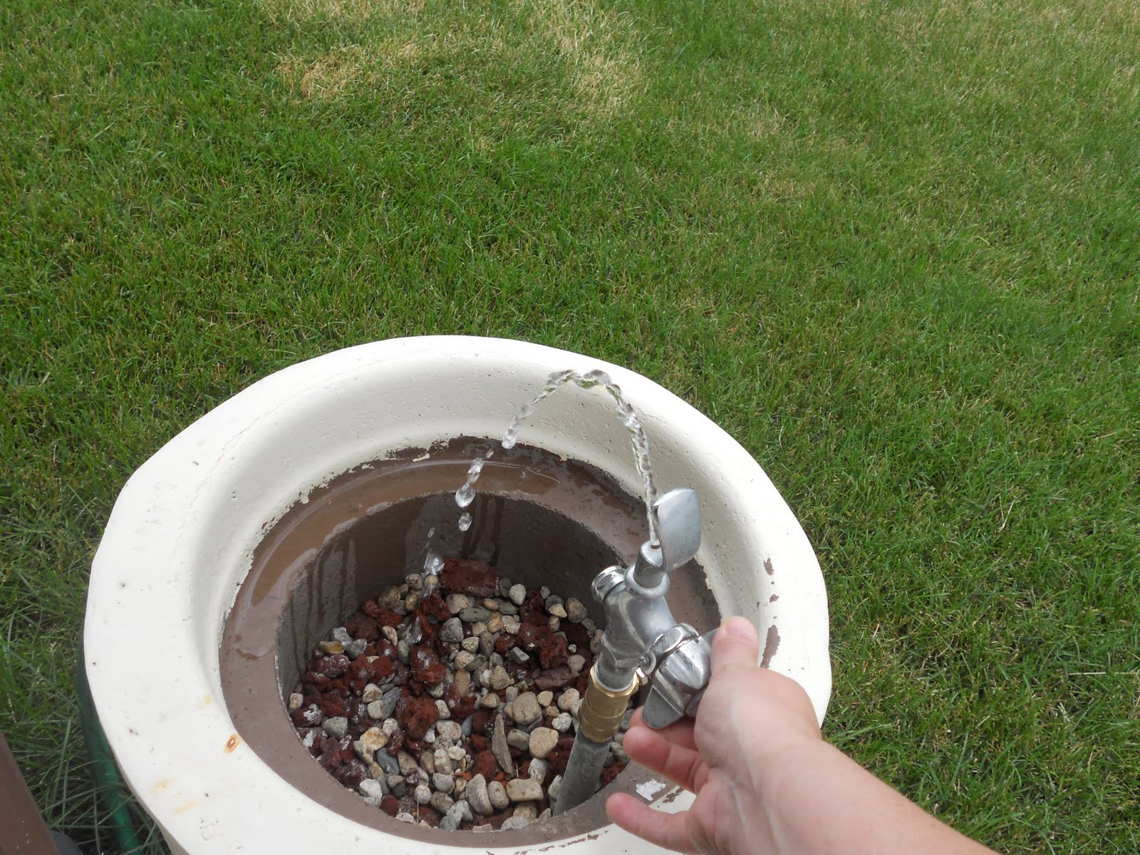 Chris and Laura & the Wamplettes Installing the Drinking Fountain