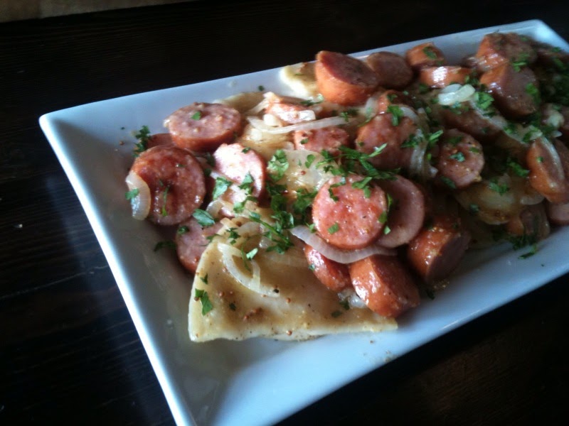 Baking and Eggs Kielbasa with Pierogies and Caramelized Onions