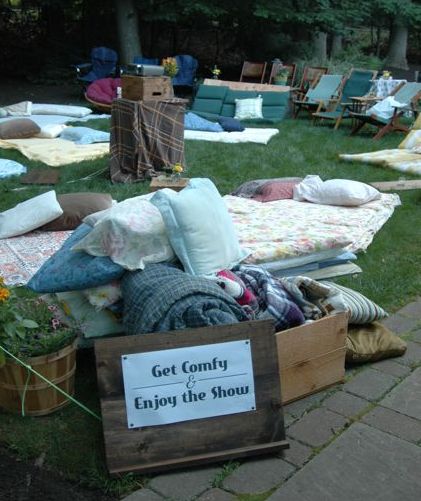 Pull together all the quilts, blankets, pillows and chairs you can ...