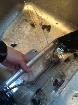 Cleaning out the tank and shield on the steam cleaner. Cleaning out the tank and shield on the steam cleaner.