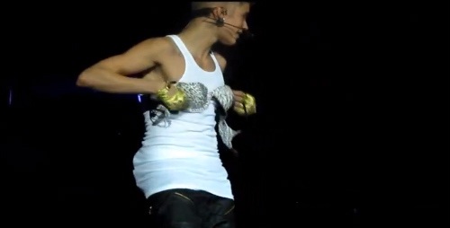 Justin Bieber wearing a bra on stage Justin Bieber wearing a bra on stage