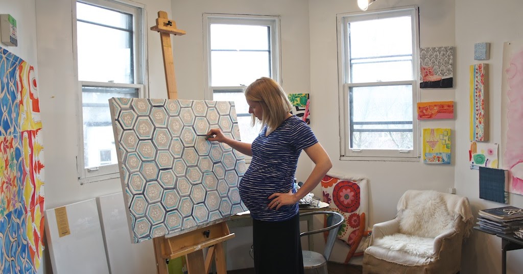 katelewisart. very pregnant and painting