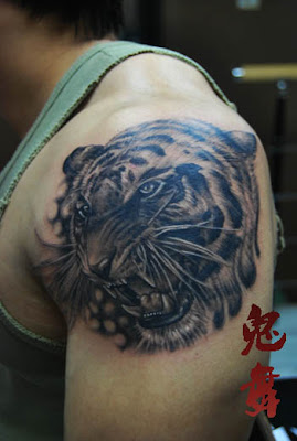 tiger tattoo design on the arm