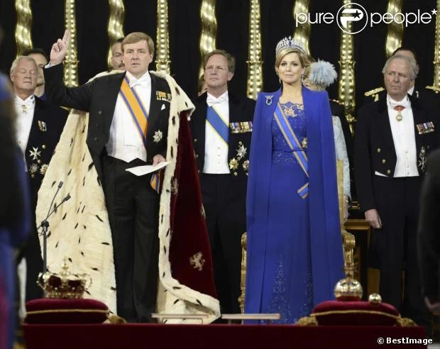 Dutch King Willem-Alexander and his wife Queen Maxima arrive to attend a religious ceremony at the Nieuwe Kerk church in Amsterdam