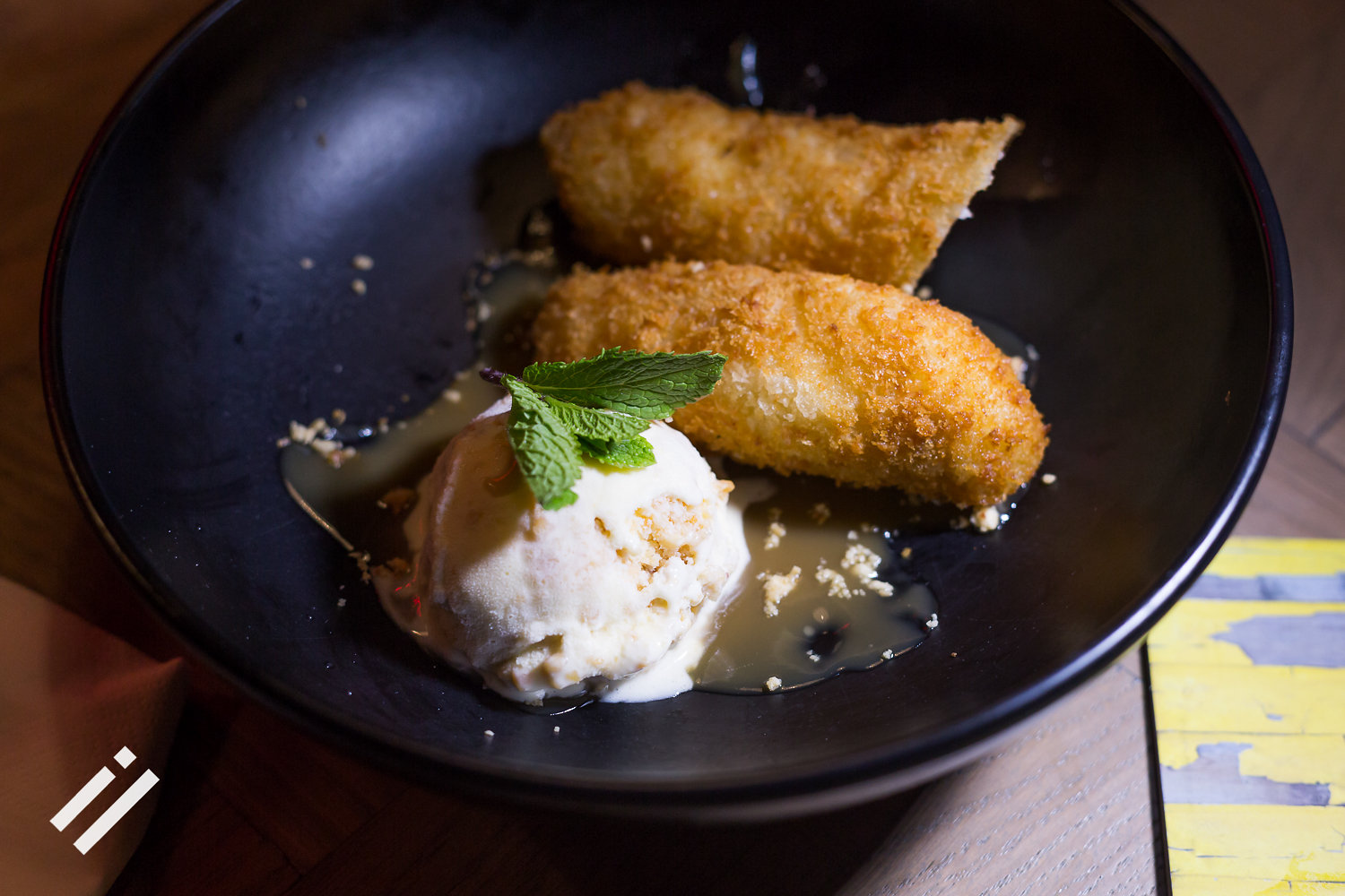 deep fried banana in a coconut batter, with a salted peanut ice cream. deep fried banana in a coconut batter, with a salted peanut ice cream.