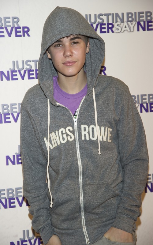 justin bieber purple shirt. Justin Bieber attended a