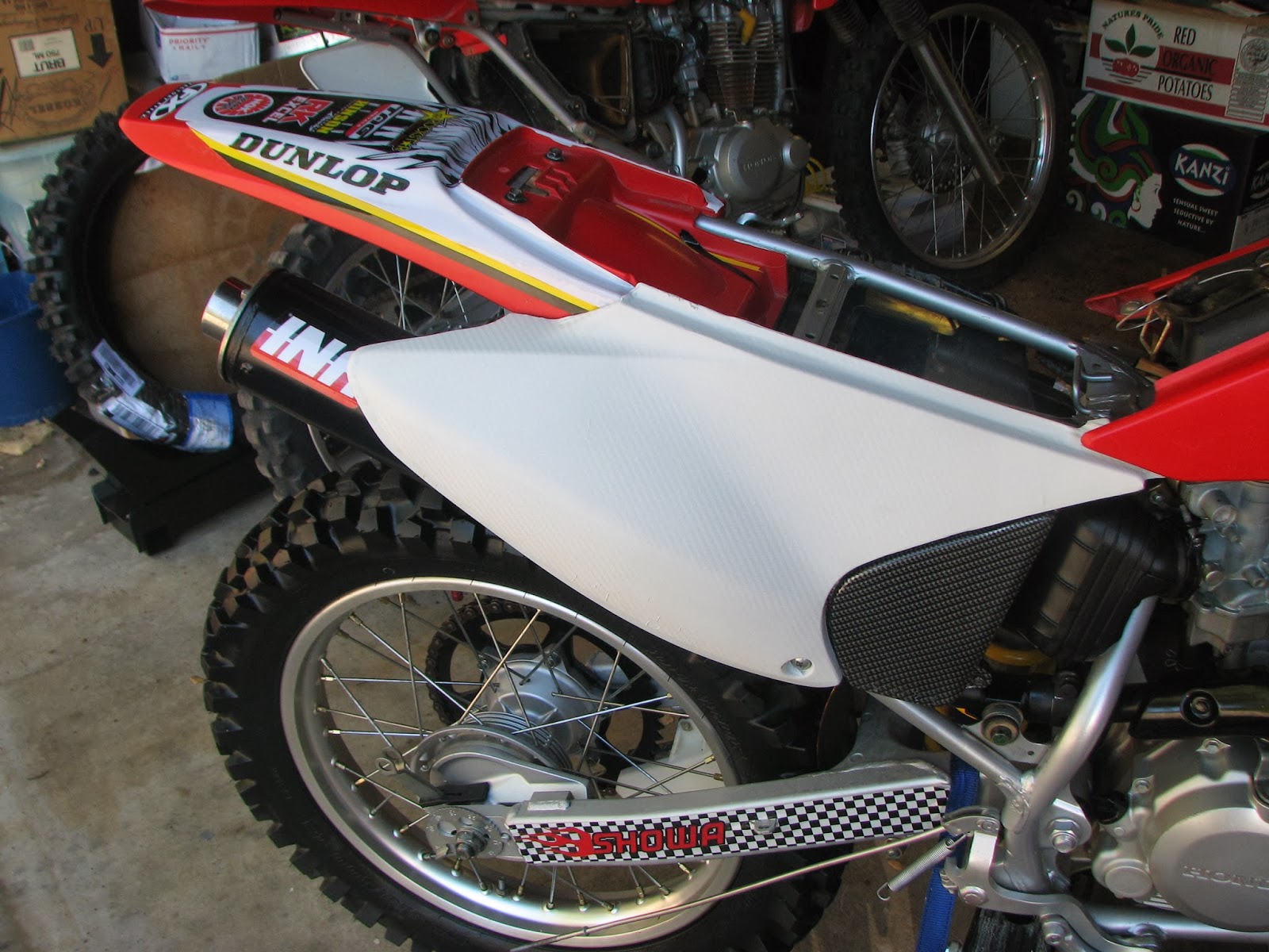Dirt Bike Information A CRF230 '03 transformation. Carbon fiber