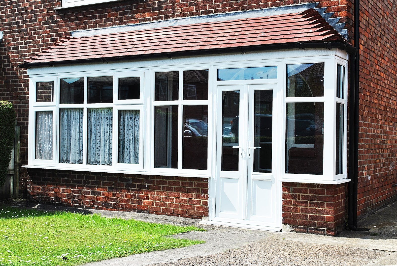 A Simple Rennovation UPVC Porch and Bay Combination with Rehau Frame