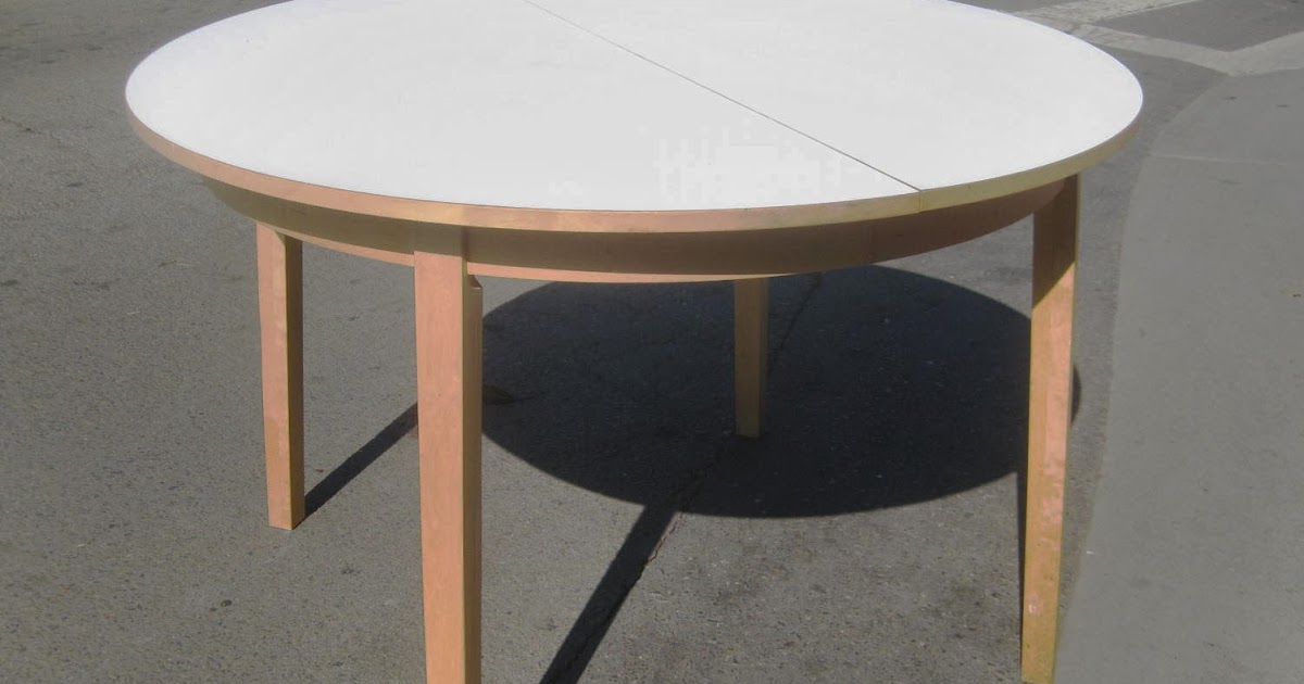 UHURU FURNITURE & COLLECTIBLES: SOLD - Round Dining Table with Leaf - $65