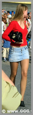 Girl in denim mini-skirt on the street