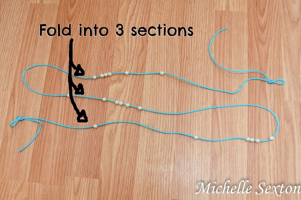 Fold the cord into 3 sections to create an "S" shape