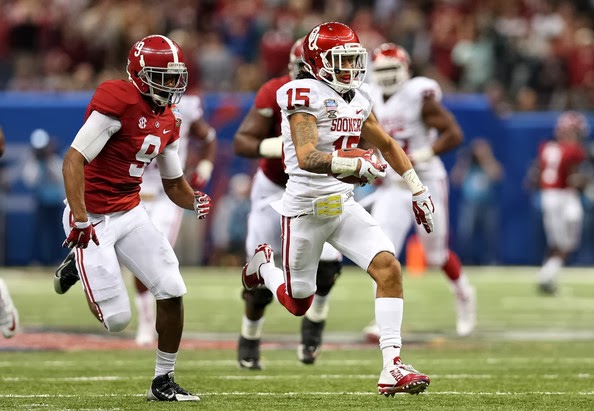 Zack Sanchez #15 of the Oklahoma Sooners runs with the ball after an interception against the Alabama Crimson Tide during the Allstate Sugar Bowl at the Mercedes-Benz Superdome on January 2, 2014 in New Orleans, Louisiana. (January 1, 2014 - Source: Sean Gardner/Getty Images North America)