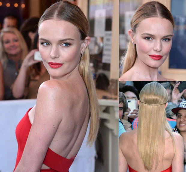 Once the look was set, she used a bit of Moroccan Oil on the ends of her hair for shine and a quick spray of Oribe Superfine Hairspray.