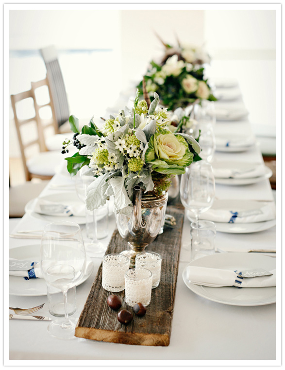 I love that long weathered wood plank in place of a table runner