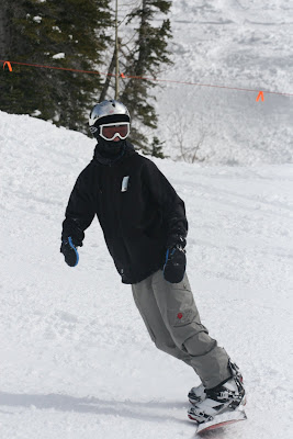 Alex snow boarding looking like a pro