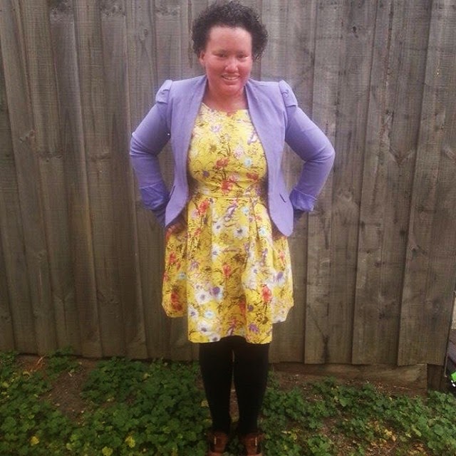 Carly Findlay yellow dress purple jacket