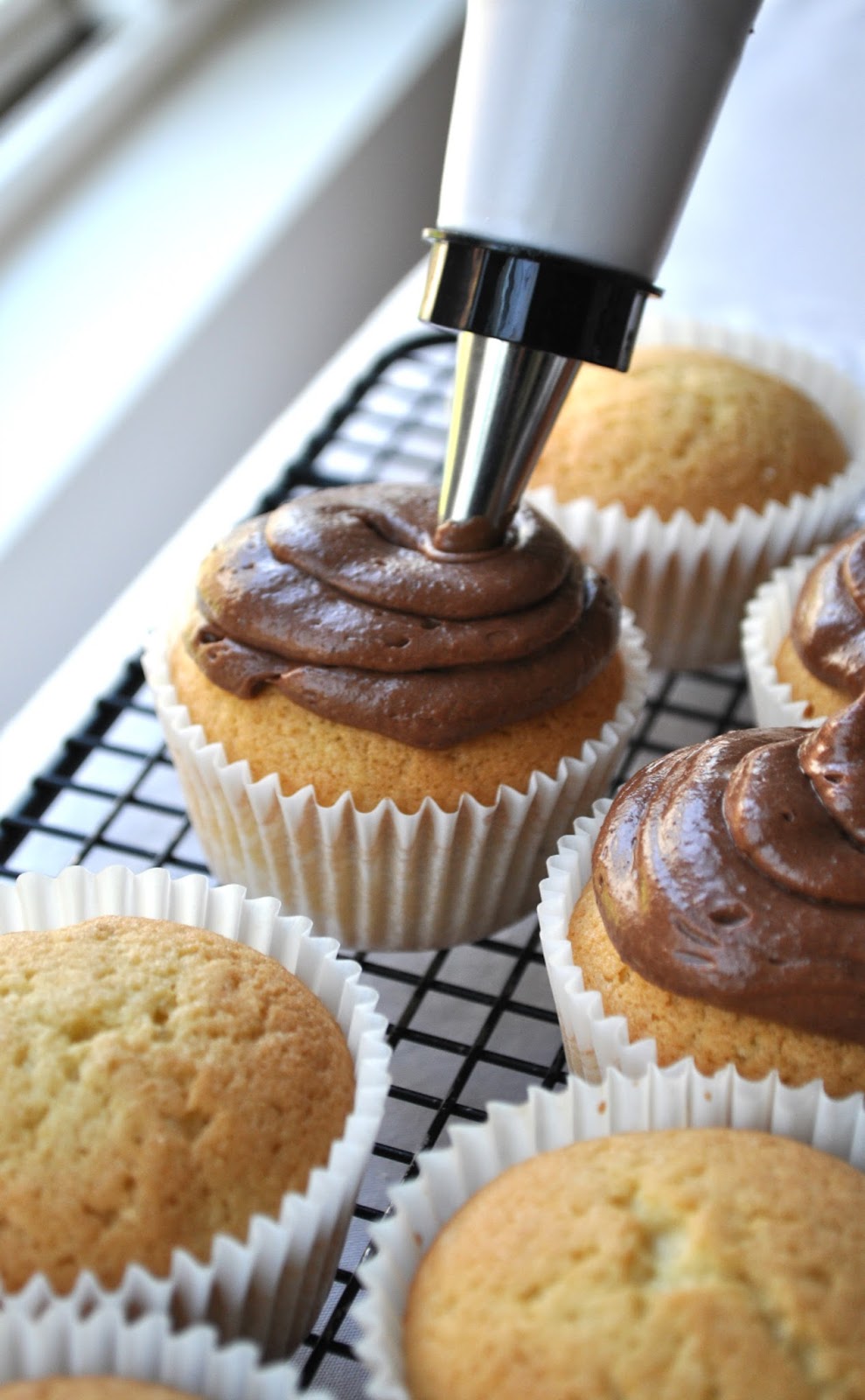 vanilla cupcakes + sour cream chocolate ganache frosting Chow Creations