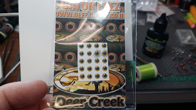http://www.castersonlineflyshop.com/deer-creek-yellow-piranha-crystal-gator-eyez/