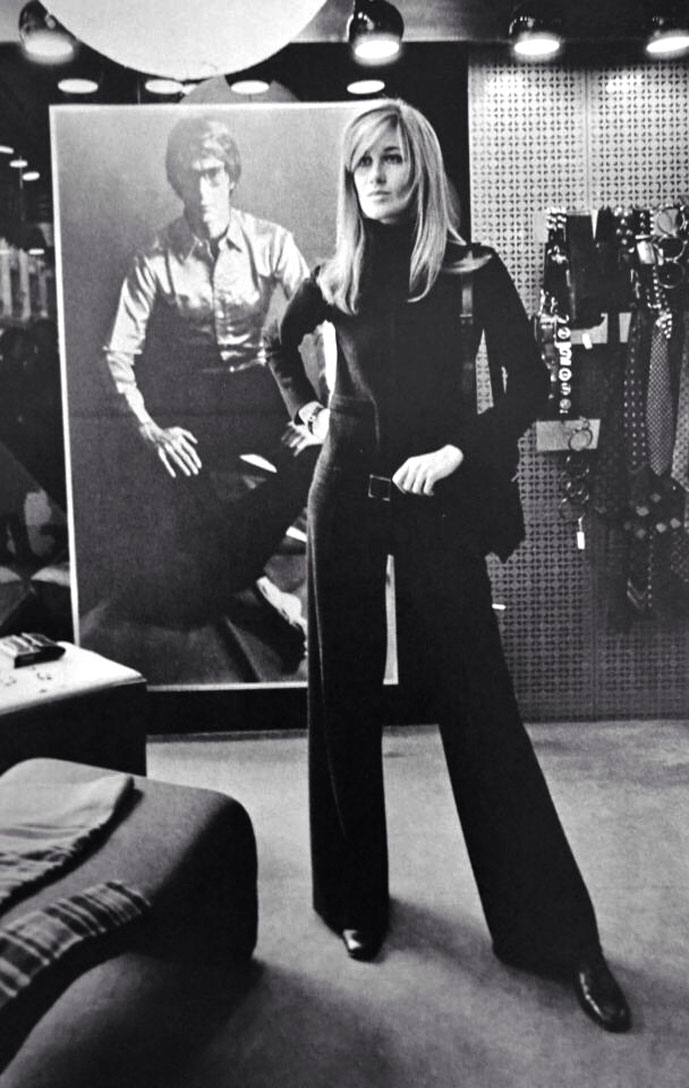 Betty Catroux wearing a jumpsuit in the Saint Laurent Rive Gauche boutique, rue de Tournon for Vogue Paris February 1969 Betty Catroux wearing a jumpsuit in the Saint Laurent Rive Gauche boutique, rue de Tournon for Vogue Paris February 1969