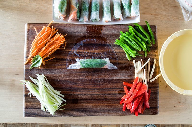 Vegan spring rolls rolling to middle