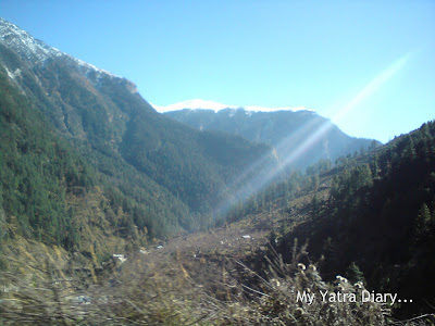 Glowing streak of snow clad mountainous peaks in the Garhwal Himalayas in Uttarakhand