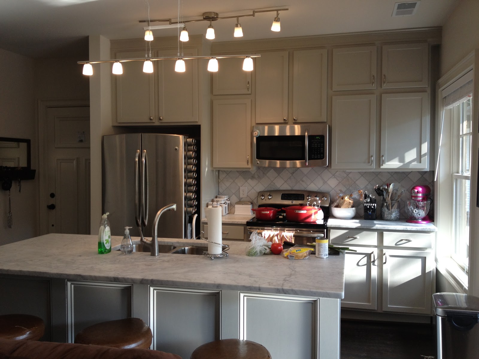 Mirrored kitchen backsplash welcome to our new home!