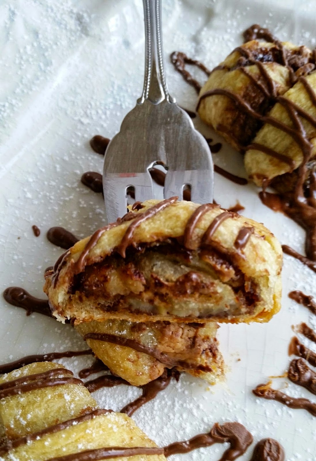bananas and marshmallows in the peanut butter nutella crescent rolls