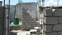 Cite Soleil, Haiti 2011: Replacing one of the damaged home