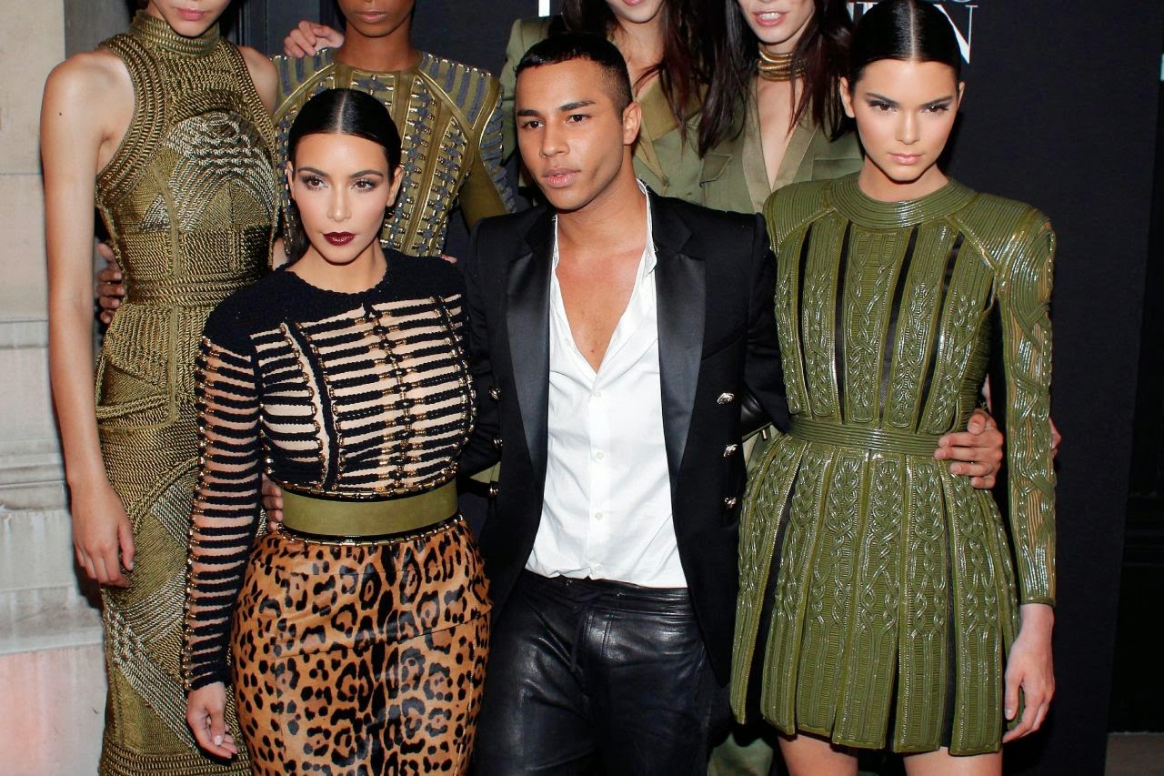 Kendall Jenner and Kim Kardashian flaunt Balmain at the 2014 Vogue