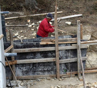 Nikolai working on the retaining wall Nikolai working on the retaining wall