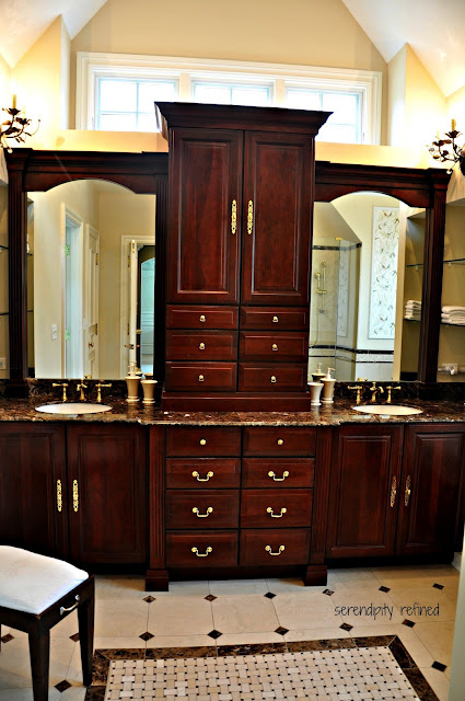 Dark Wood Master Bathroom Cabinets, Sconces, Mirrors Tile, Glass Shelves, Crema Marfil Marble, Emperador Dark Granite, shower, tile rug, mosaic, tub surround