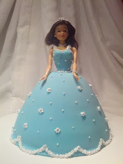 Cake stuffed with sweet coconut, decorated with fondant and royal icing.