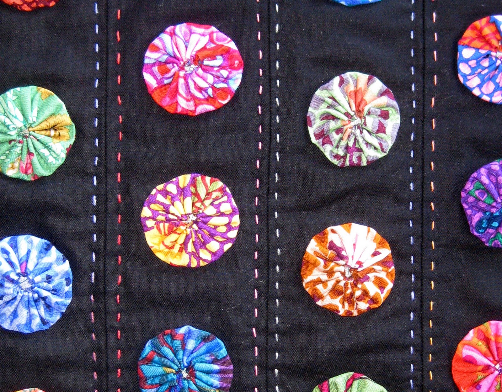 piecefullife finished yoyo mini quilt