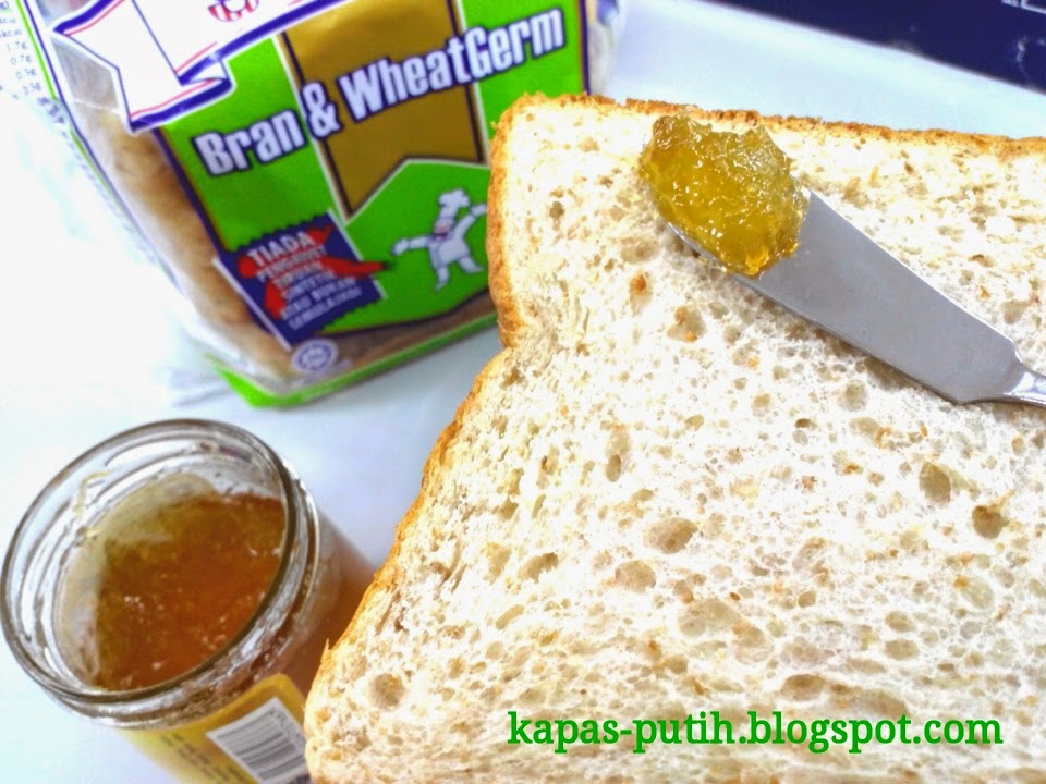 Slices of bread with spread of pineapple jam to kick my day!! Oh my