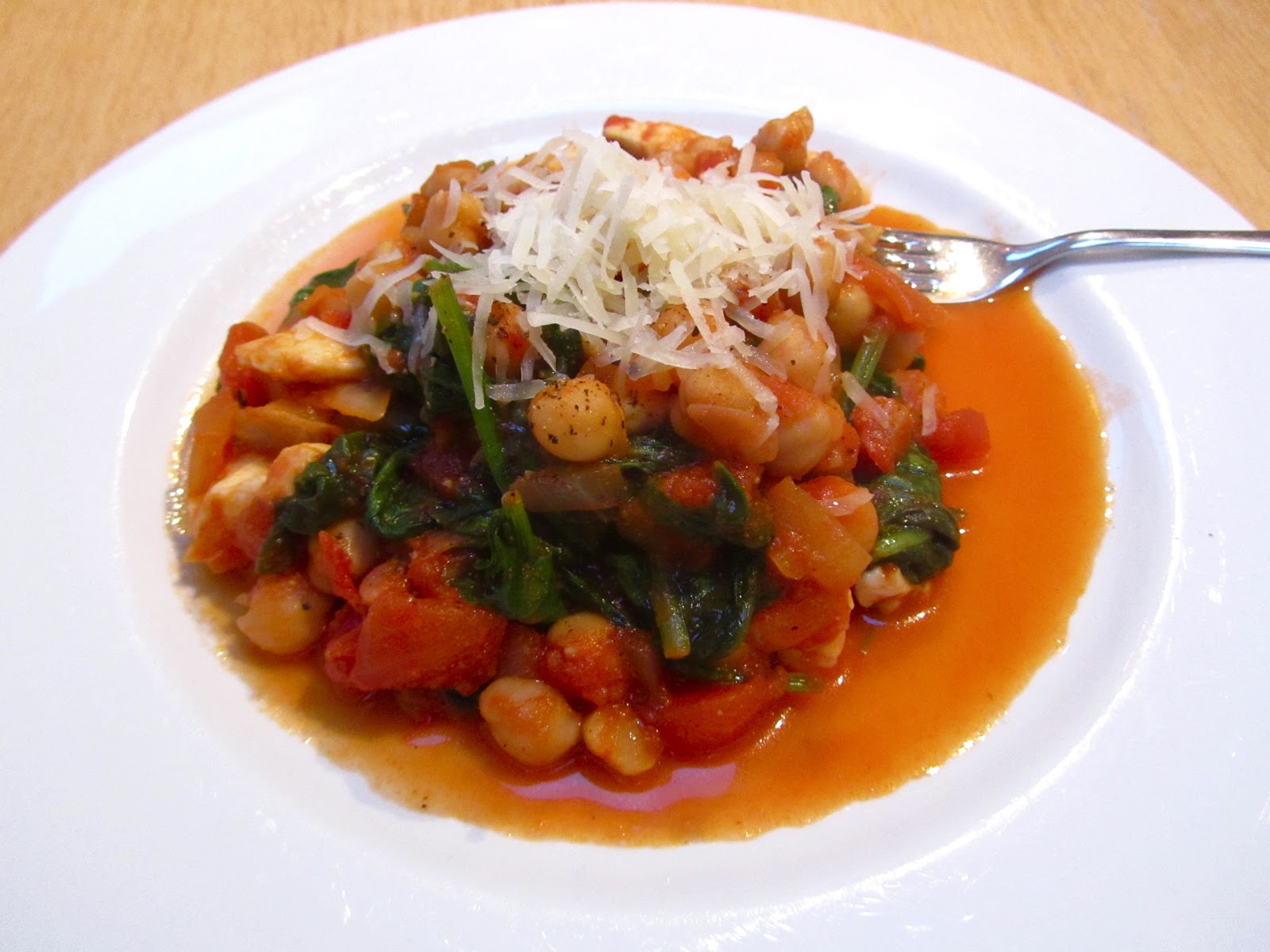 Harissa spiced chickpeas with halloumi and spinach