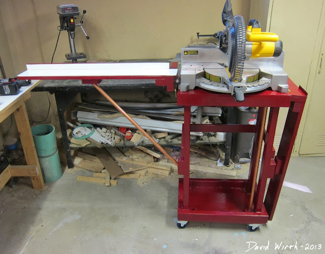wood miter saw stand, folding arms, on wheels, woodshop