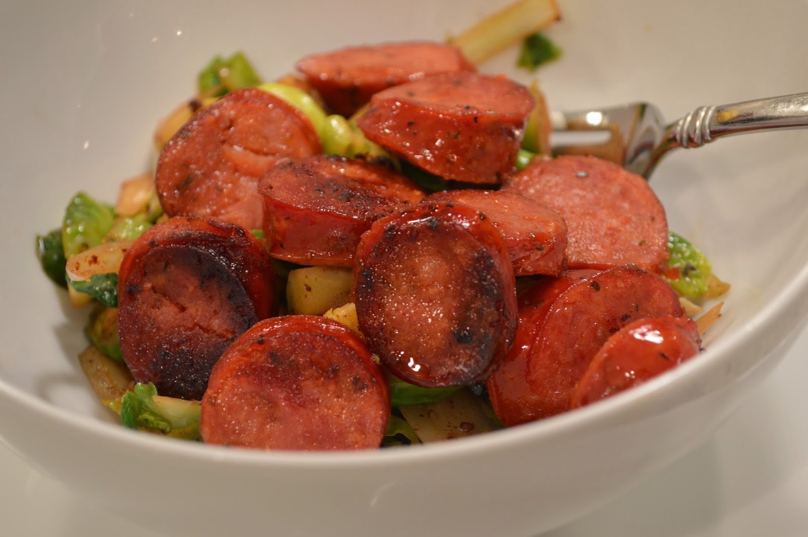 peace. love. & good food. Shaved Brussels Sprouts Salad + Andouille