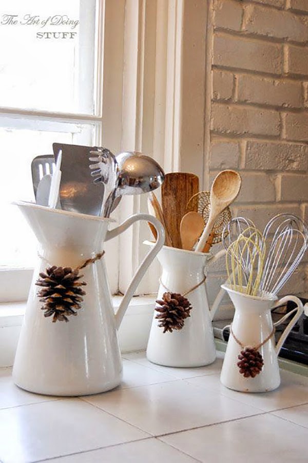 Pinecone necklaces on jugs in the kitchen featured @hearthandmadeuk Decorate your home for #fall #autumn using Pinecones & Ikea Jugs! #homedecor #decor