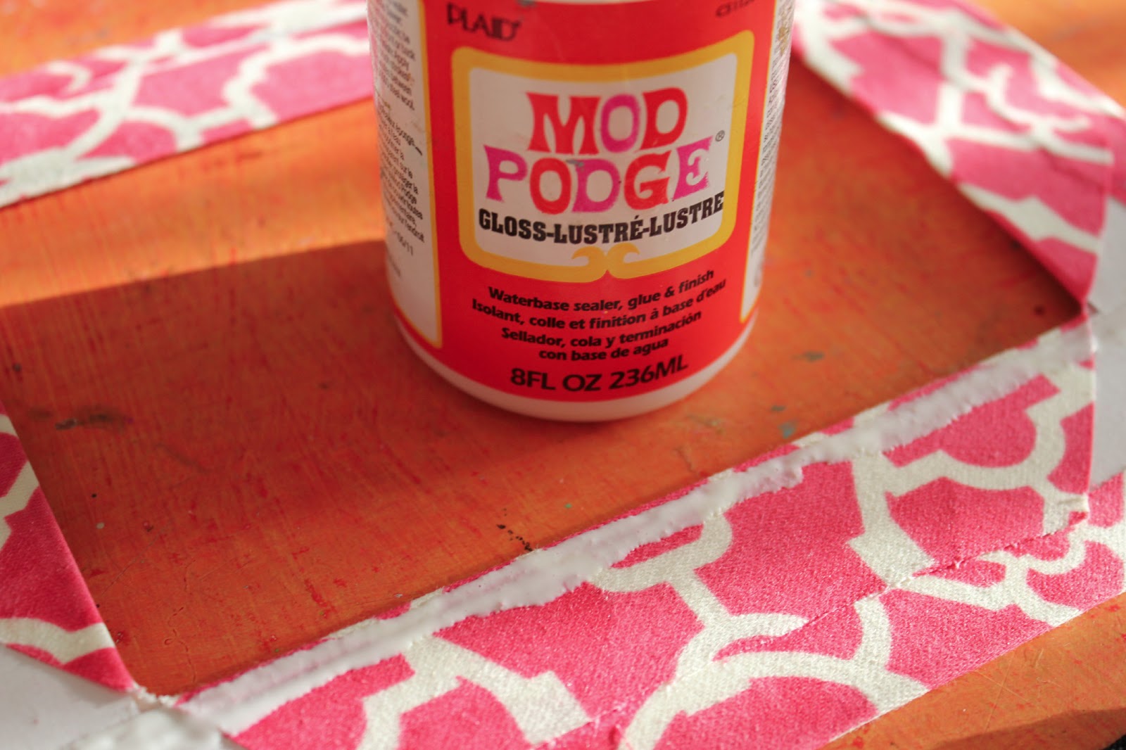 Cathie Filian DIY How to cover a photo mat with fabric and Mod Podge.