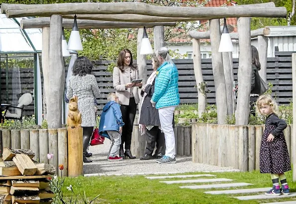 Crown Princess Mary of Denmark attended the opening of the Ringsted Krisecenters Sensory Garden and Playground on May 9, 2015 in Ringsted, Denmark. 
