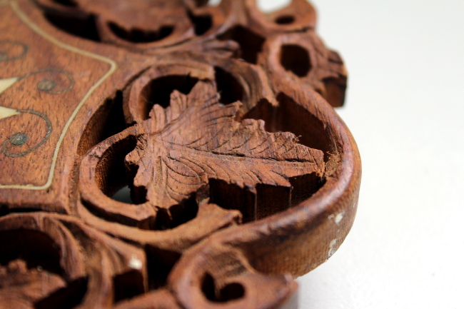 carved wood leaf