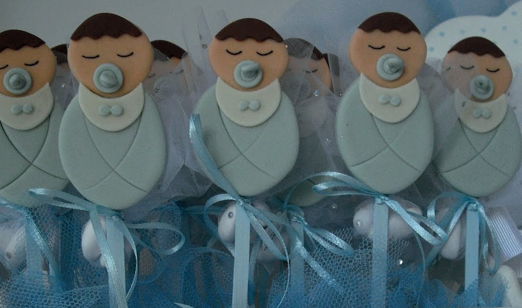 GÜL�ÜMSE Kundakta bebek ve kapı süsü..