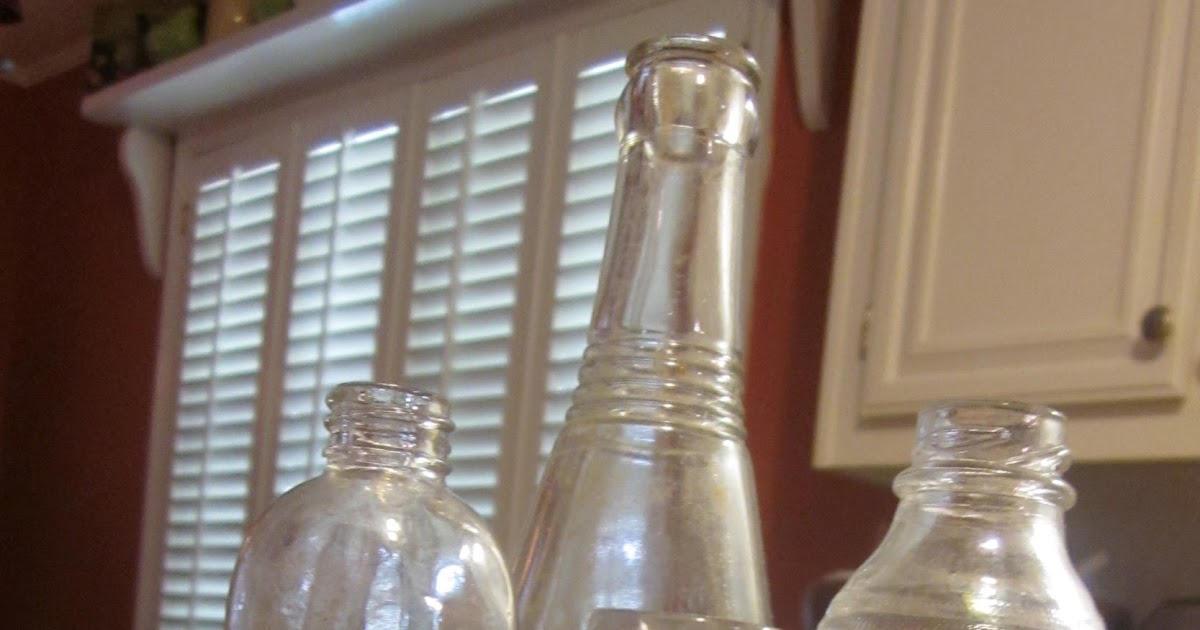 She Endeavors Cleaning Old Bottles