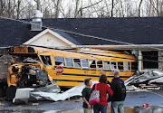 A school bus is crushed into a business on the east side of U.S. 31 in . (school bus henryville)
