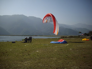 A "Tandem Paraglider" landing  next to Phewa Lake.(Tuesday 22-11-2011)