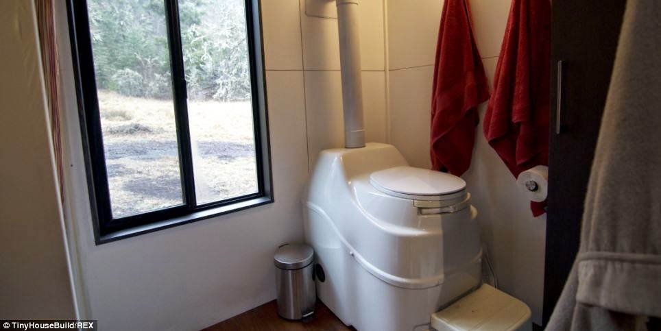 The tiny house has a shower and toilet. - This Couple Got Out Of The Rat Race. And Built This Tiny Home For $33K. The tiny house has a shower and toilet. - This Couple Got Out Of The Rat Race. And Built This Tiny Home For $33K.